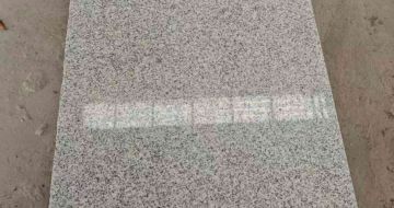 临沂芝麻白光面毛板